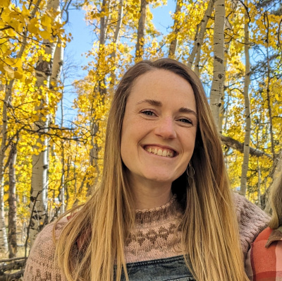 Mariama smiles in the aspens of Colorado