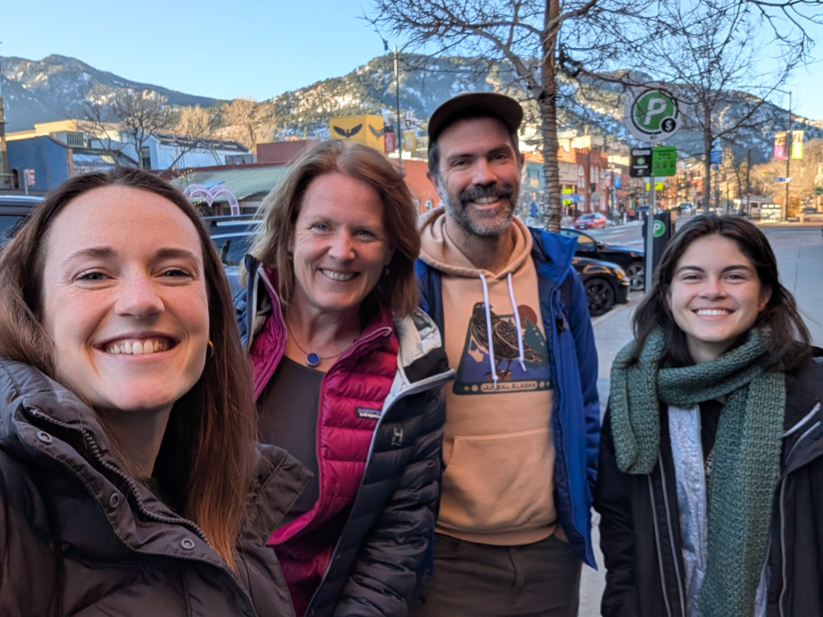 Mariama, Anne, Brad and Madison smile at the camera in greeting, and hope to see you at AGU!