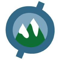 Blue circle with green mountains covered in snow in the center